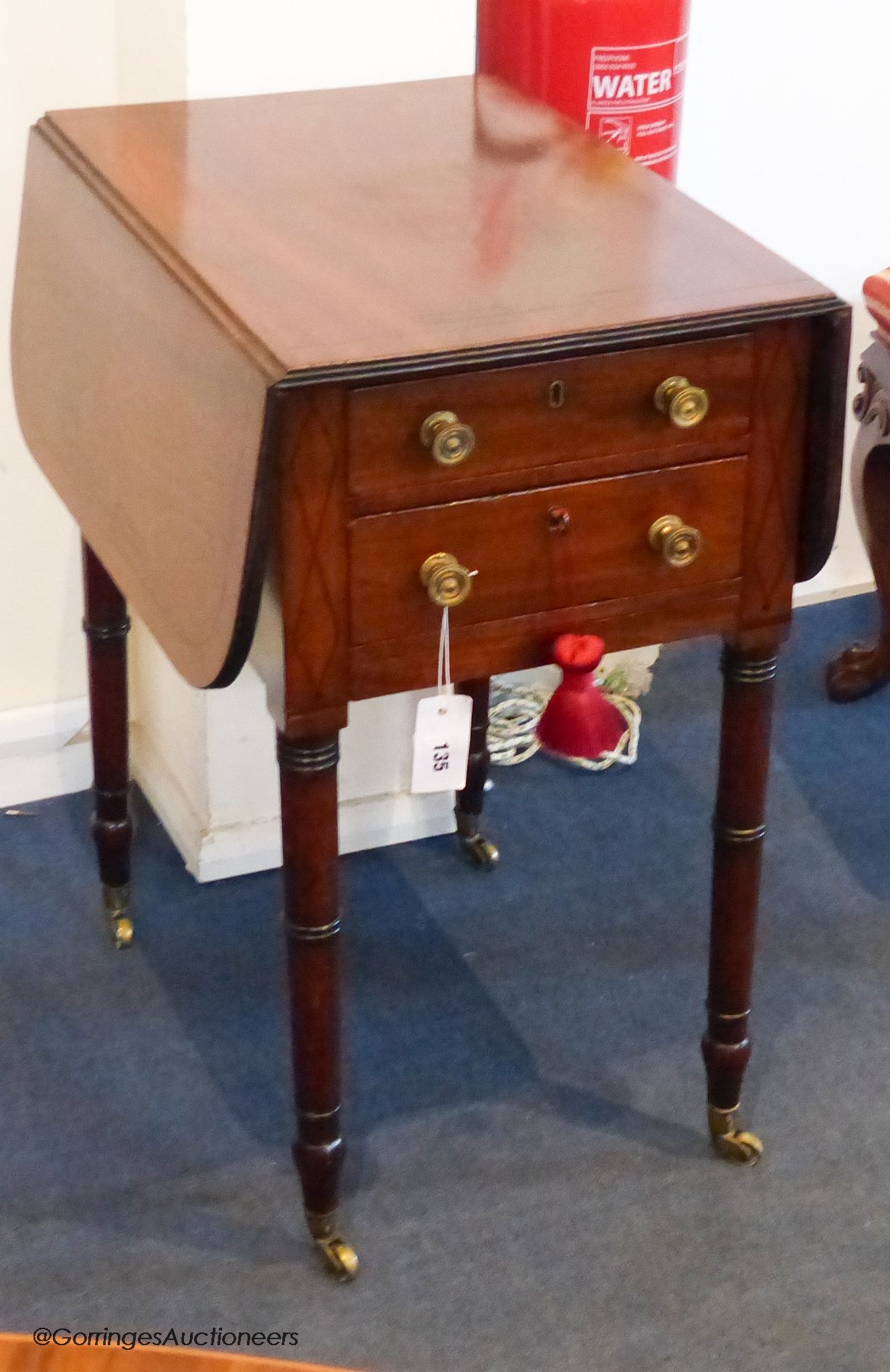 A George IV ebony strung mahogany Pembroke work table, 81 cm wide when open, 70.5 cm high, 52.5 cm deep